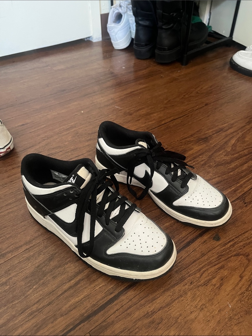 Nike Women's Black and White Low-Top Sneakers with Perforated Toe